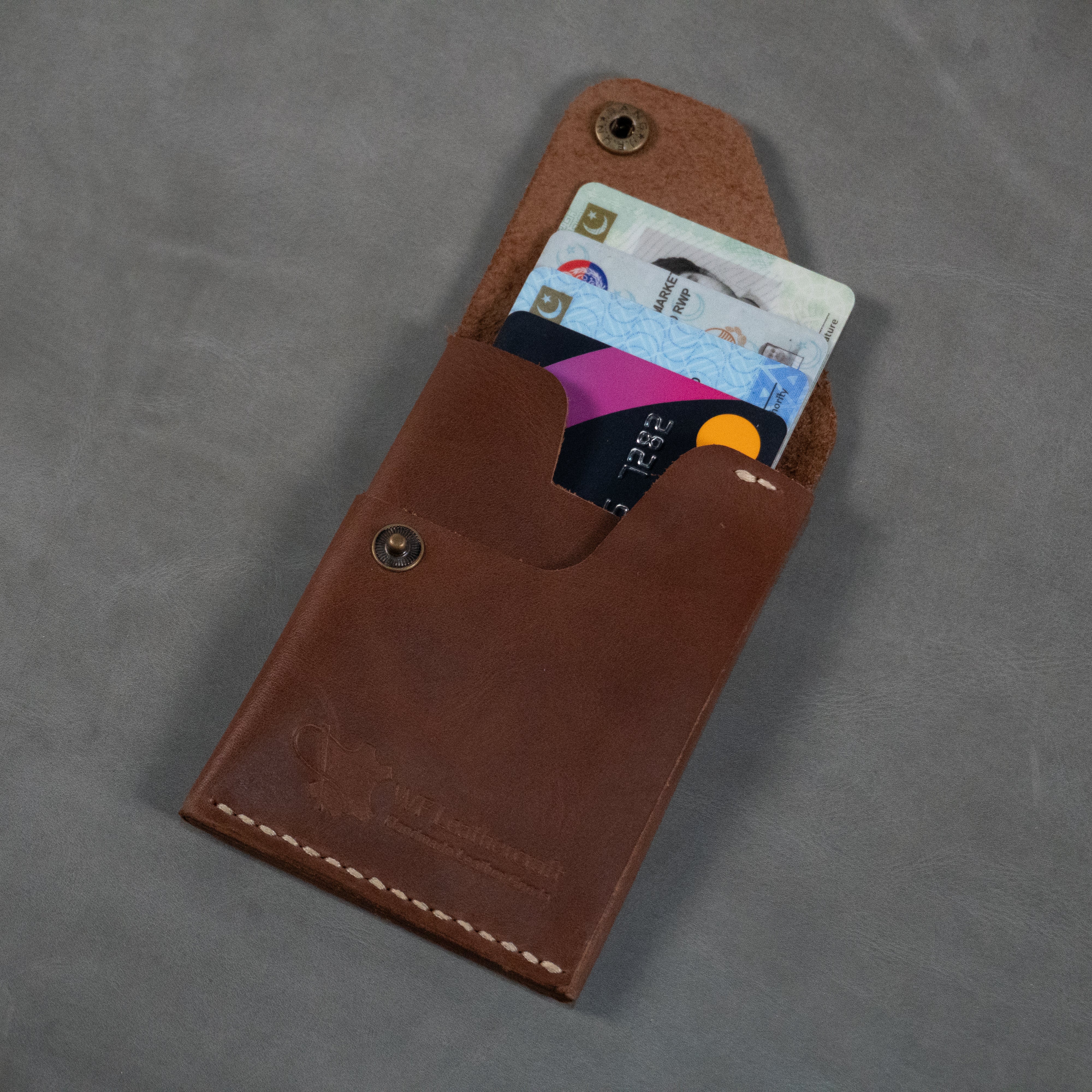 genuine leather wallet price in Pakistan, leather wallets in Pakistan gents wallet leather, smart wallet in Pakistan, leather wallet for men, long wallet for men, bifold leather wallet in Pakistan, long bifold wallet, genuine leather bifold wallet, best bifold wallet,handmade leather wallets in pakistan